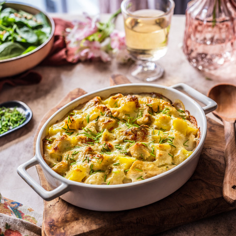 Baked chicken and potatoes with mushroom sauce 