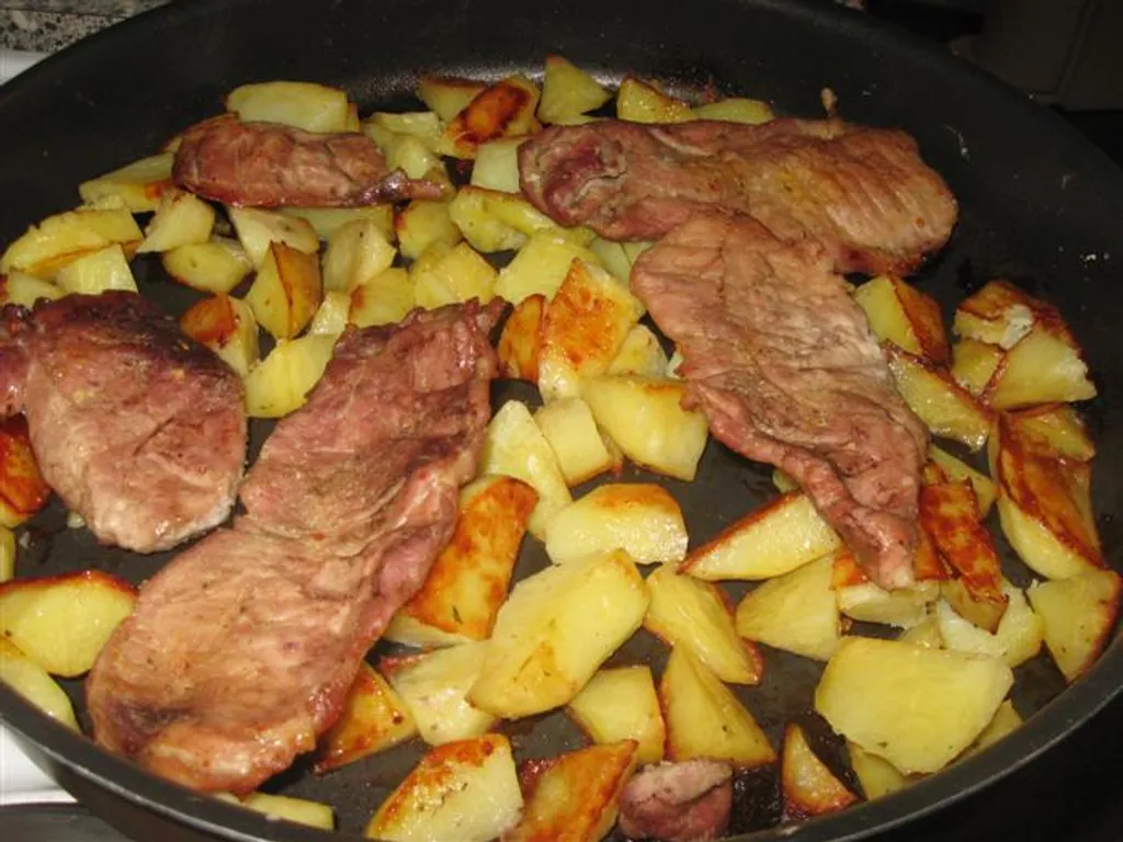 Pecene snicle sa krompiricima