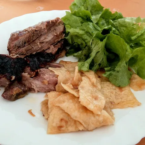 Marinirani pureći batak u soku od naranče s mlincima